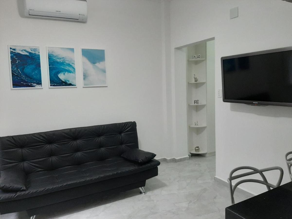 Apartamento Pitangueiras - Guarujá Bagian luar foto